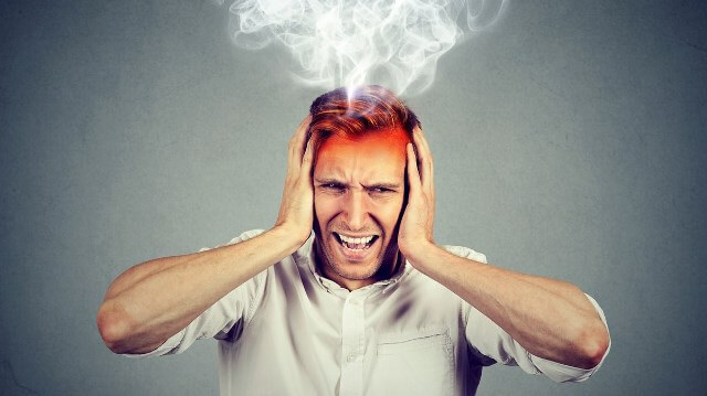 болит голова от стресса